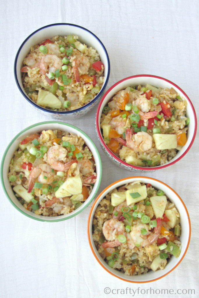 Easy Shrimp Pineapple Fried Rice recipe for dairy-free and gluten-free lunch ideas or meal prep ideas #dairyfree #glutenfree #mealprep #seafood for full recipe on craftyforhome.com