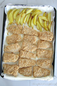 Oven baked fish and chips recipes on the sheet pan for an appetizer or finger foods ideas. Easy, kids friendly meal, dairy-free, healthy. For full recipe on craftyforhome.com