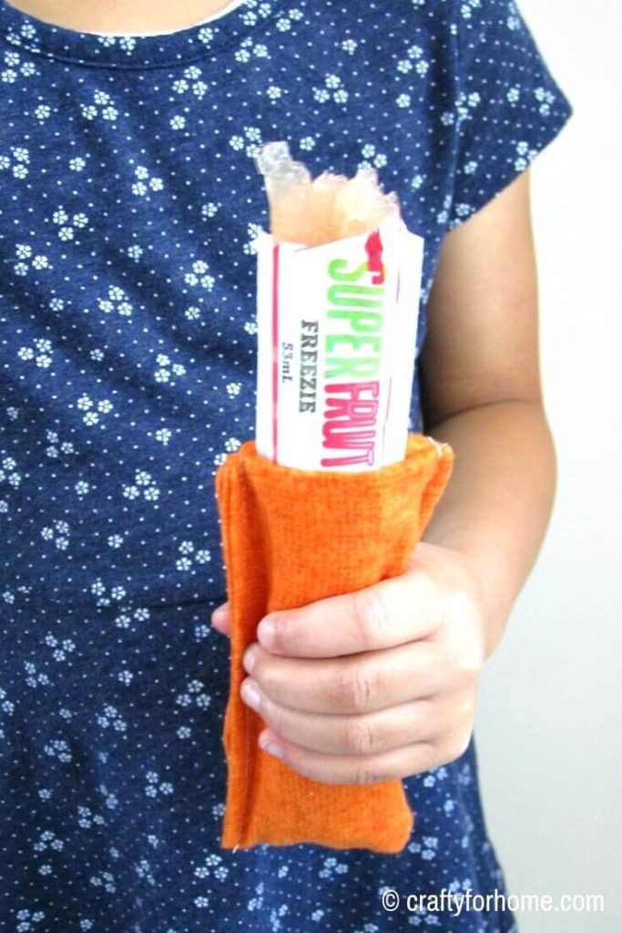 How To Sew Freezie Cozy | An easy to follow tutorial on how to make a freezie cozy to keep kid’s hand warm when they are enjoying their favorite cool treat. #easycrafts #DIYfreeziecozy #freeziecozytutorials #sewingtips #DIYgiftideas #craftforkids #summercrafts #sewingpatterns #sewingforkids #flanelcrafts for full tutorials on https://craftyforhome.com