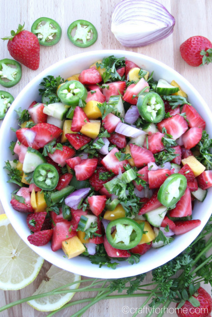 This strawberry salsa is easy, quick and fresh to serve for any summer party. Serve it on its own or a side dish for grilling season. #dairyfree #glutenfree #veganrecipes #strawberrysalsa for full recipe on craftyforhome.com