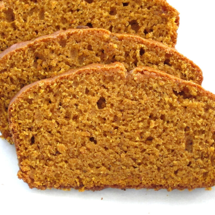 Easy classic pumpkin bread with a dash of pumpkin spices. A loaf of bread that stays soft and moist in the next day too. Dairy free, nut free.