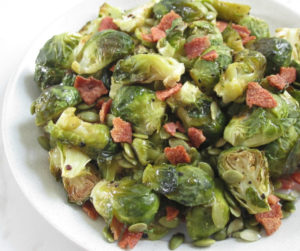 Easy oven roasted brussels sprouts recipe with maple glaze and topped it up with crispy bacon. A quick and simple meal for the family. Dairy-free, nut-free, gluten-free.