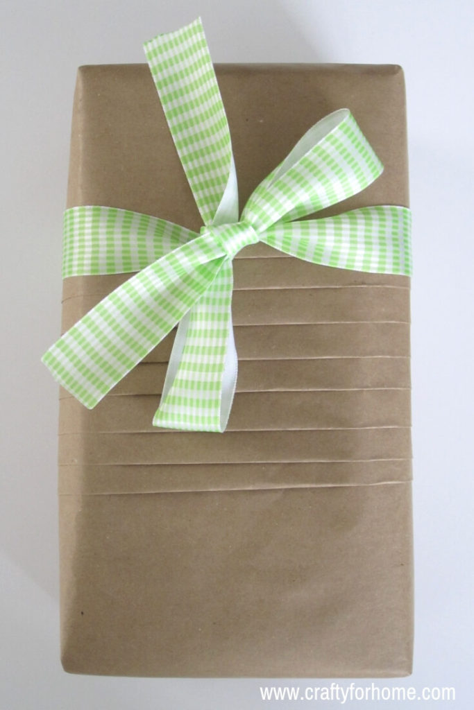Brown Paper For Gift Wrapping Ideas | Use brown paper for a simple DIY gift wrapping ideas and decorate it with ribbon, lace, and decorative cord for Christmas and any occasions. #giftwrappingideas #giftwrapping #giftwrappingforchristmas #easygiftwrapping #brownpapergiftwrapping #kraftpapergiftwrapping for full tutorials on www.craftyforhome.com
