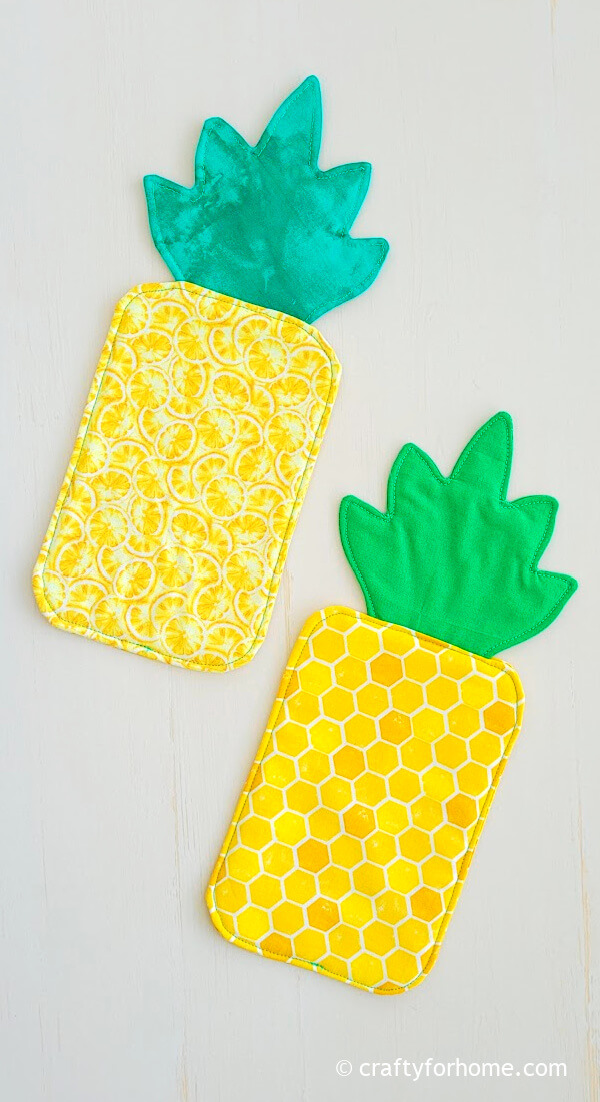 Pineapple coasters from yellow fabric.