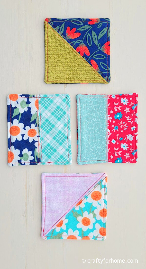 Four colorful patchwork coasters.