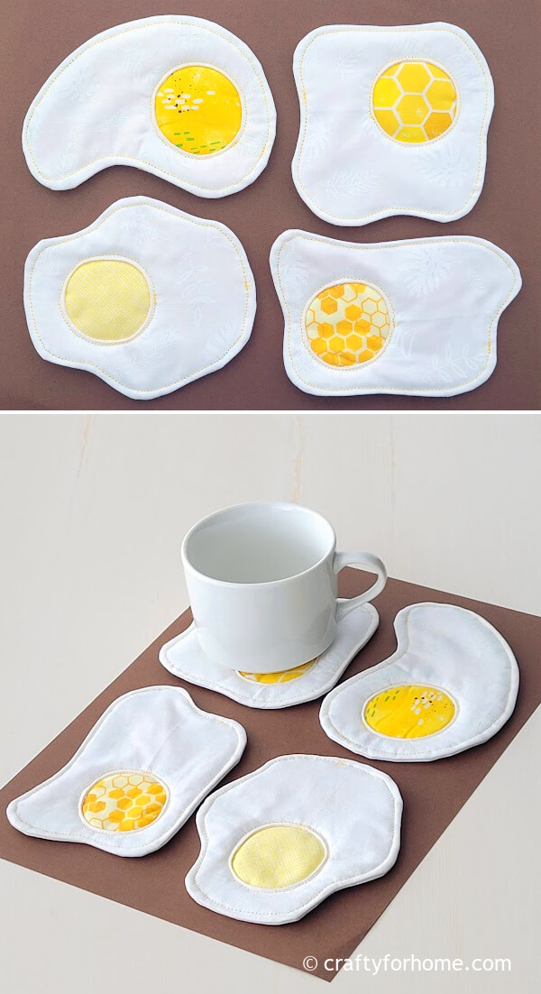 White mug with fabric egg coasters.