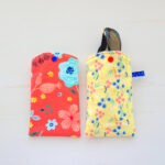 Sunglasses case from red and yellow cotton fabric.