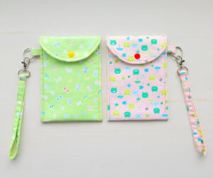 Phone Pouch With Button And Wristlet.