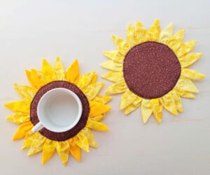 Two Fabric Sunflower Coasters.