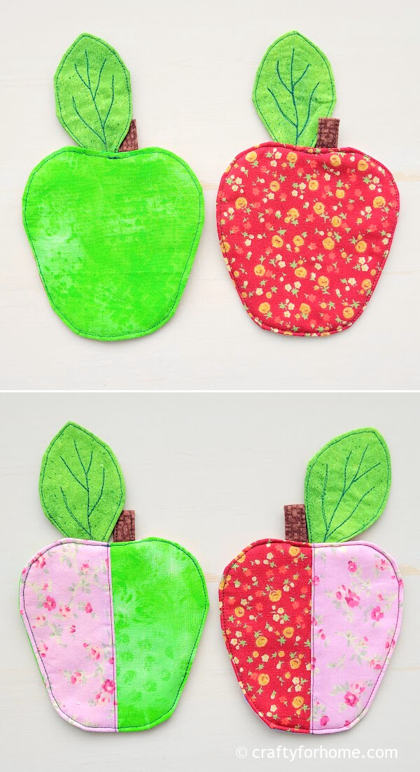 Four fabric apple coasters.