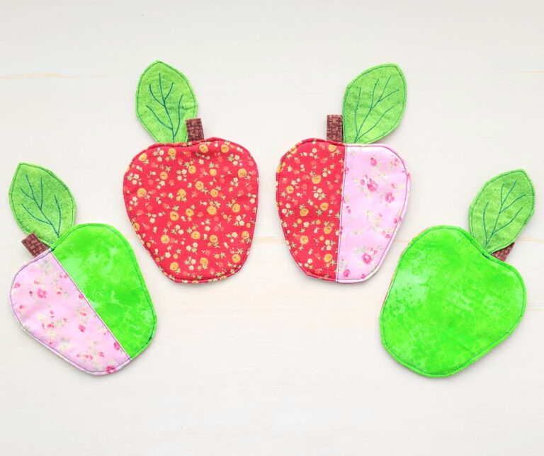 Green and red fabric apple coasters.