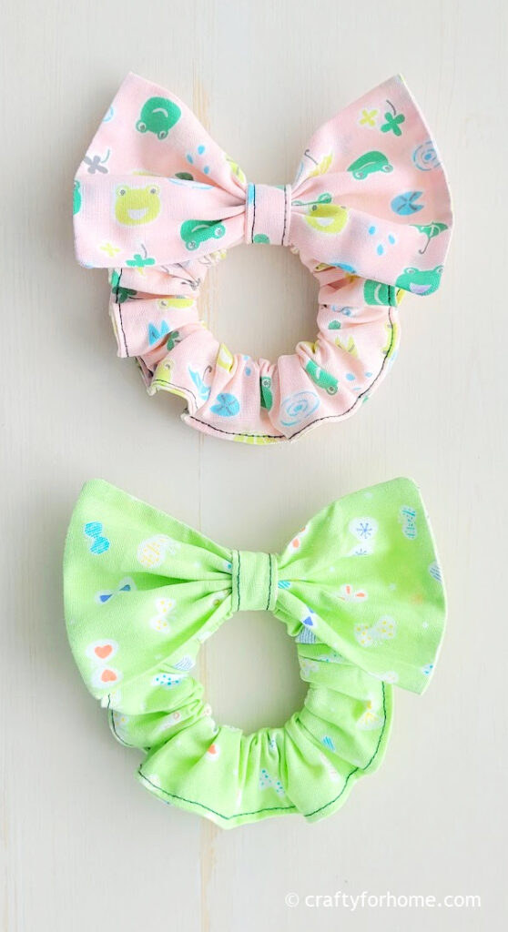 Pink and green bow scrunchie.