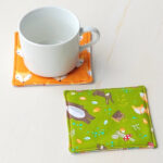 Fabric square shape coasters.