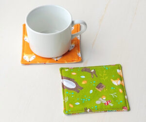 Fabric square shape coasters.
