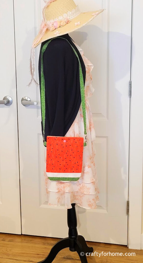 Mannequin modeling the bag.