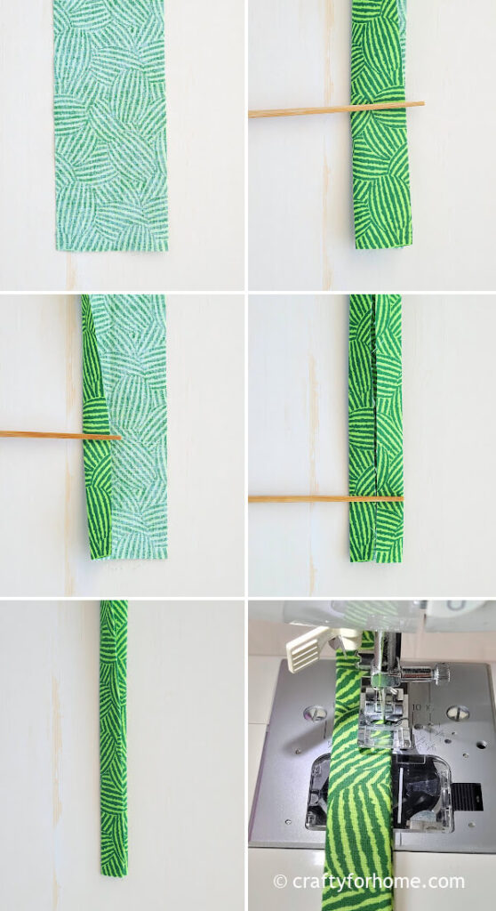 Sewing green bag strap.