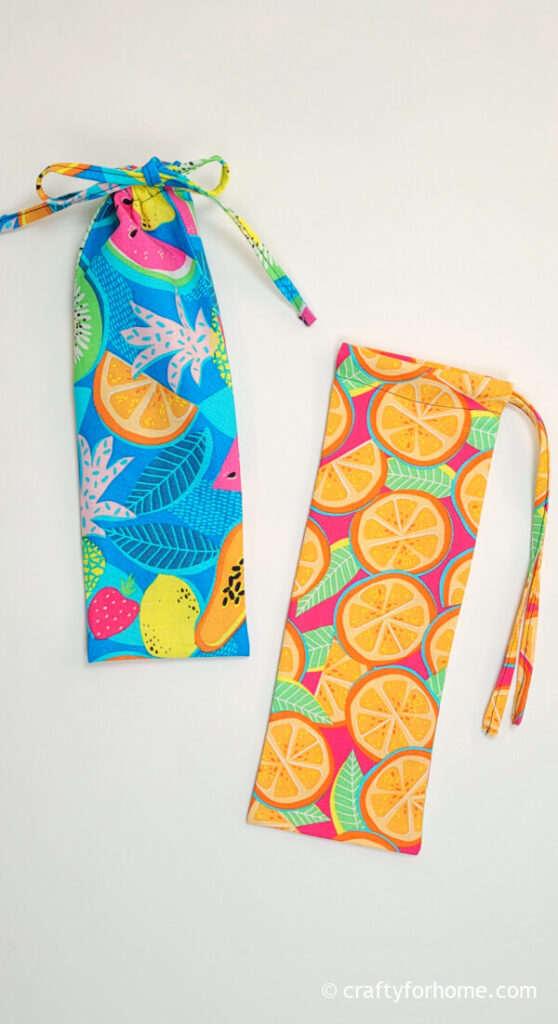 Orange and blue cutlery drawstring bag.