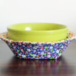 Fabric round bowl cozy reversible.
