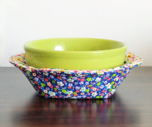 Fabric round bowl cozy reversible.