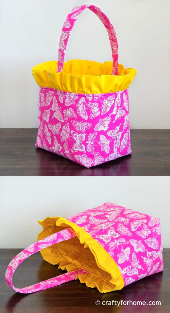 Fabric basket with yellow frilly fabric.